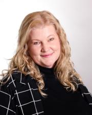 Amy Beecher, Assistant Director